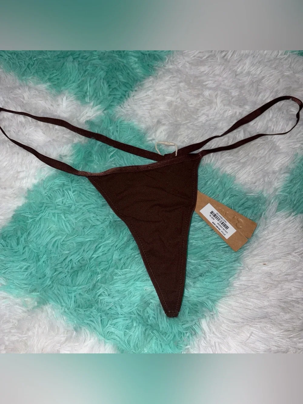 Skims Thong in color cocoa size XL